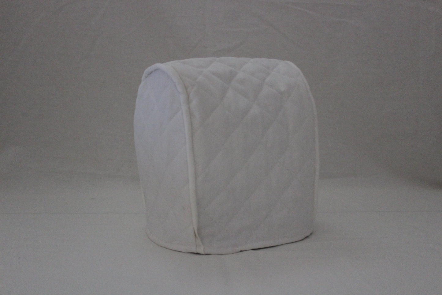 White Quilted Can Opener Cover